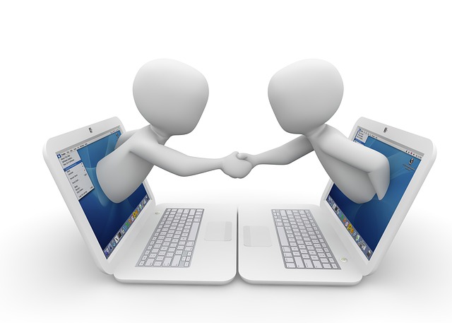 character shaking hands from a laptop screen